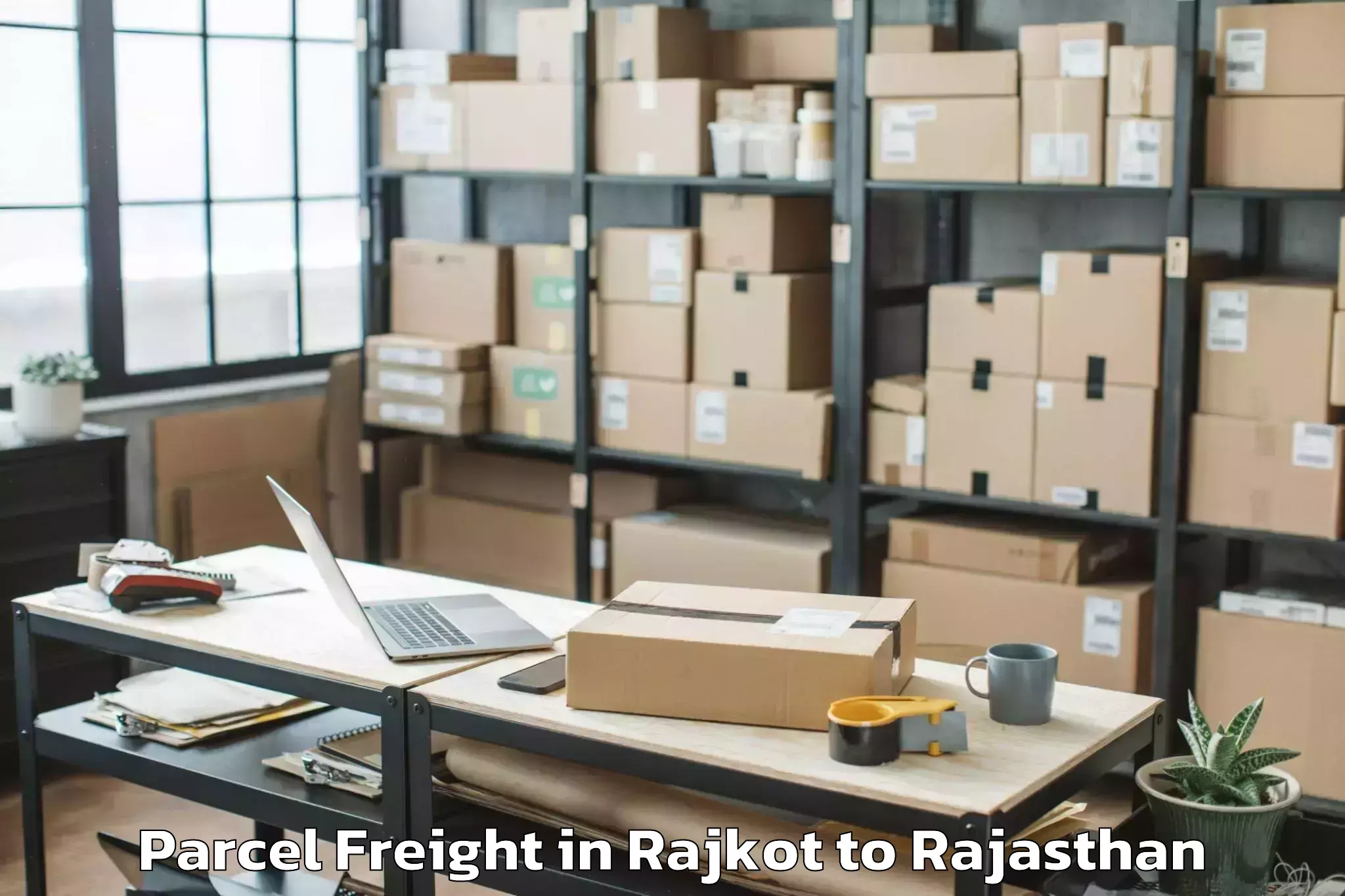 Rajkot to Dhaulpur Parcel Freight